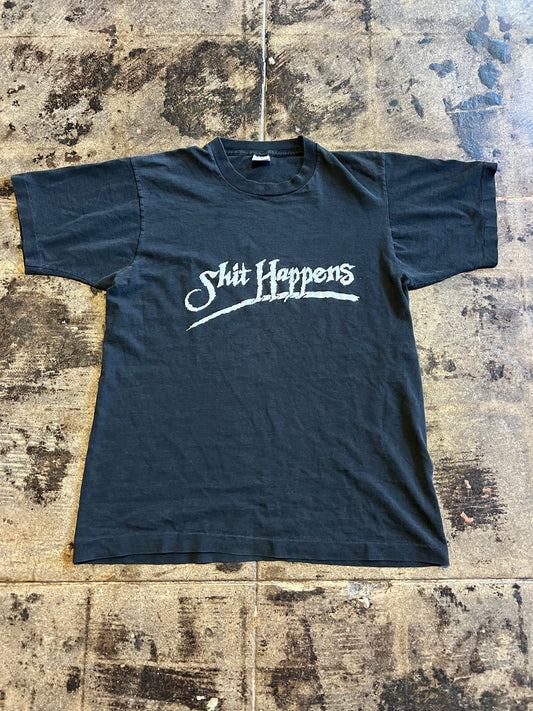 SHI HAPPENS TEE
