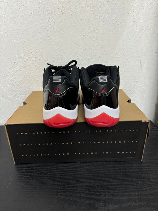 JORDAN 11 LOW BRED