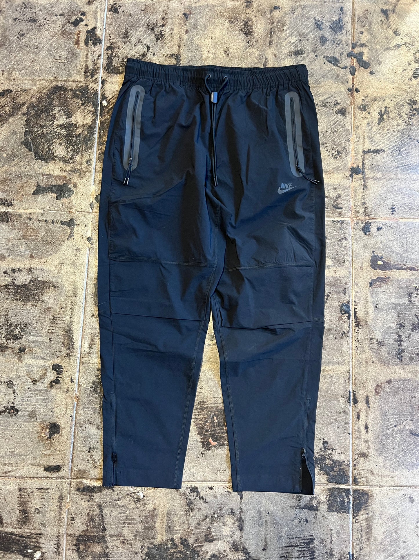 NIKE TECH TRACK PANTS