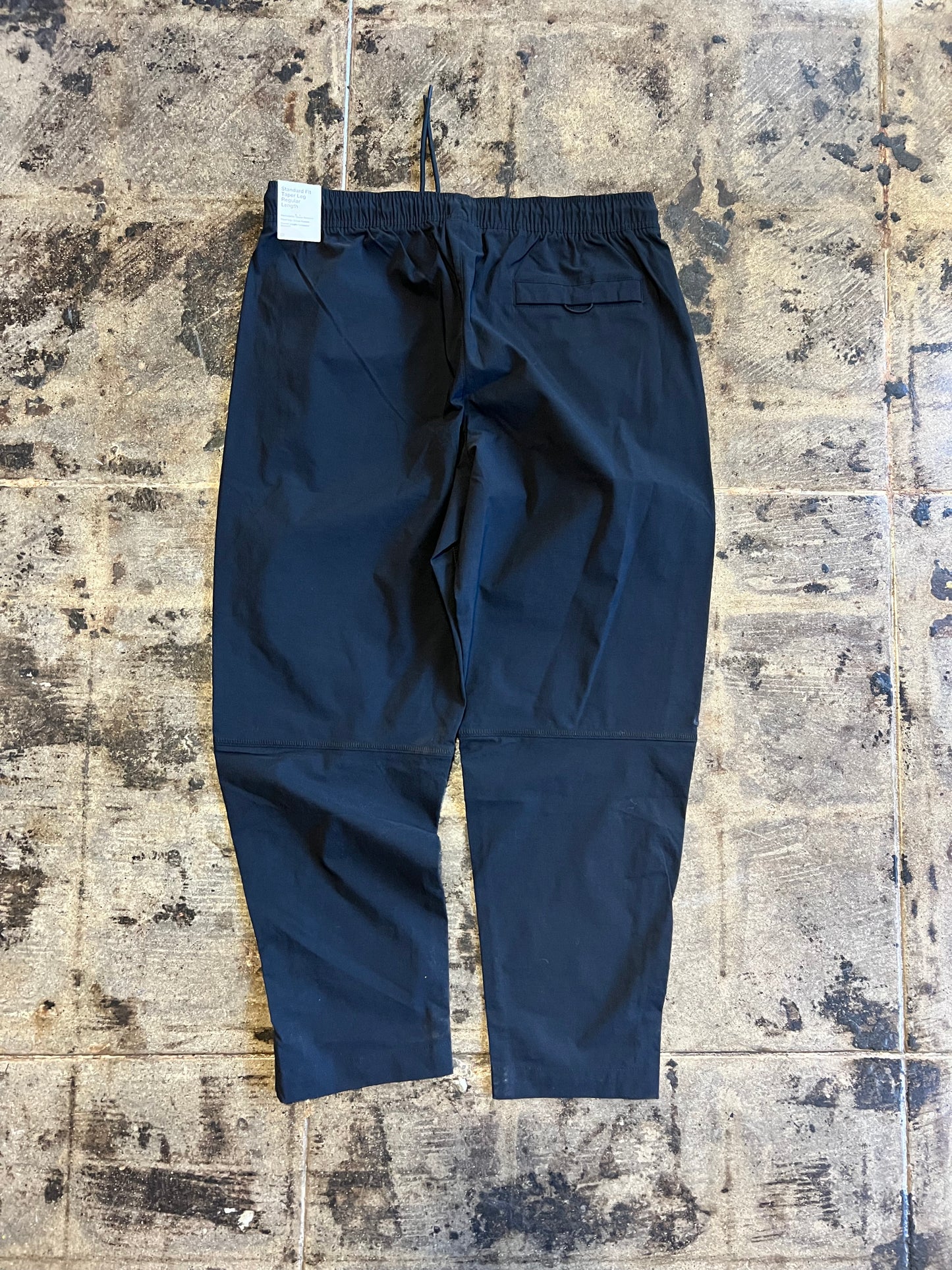 NIKE TECH TRACK PANTS