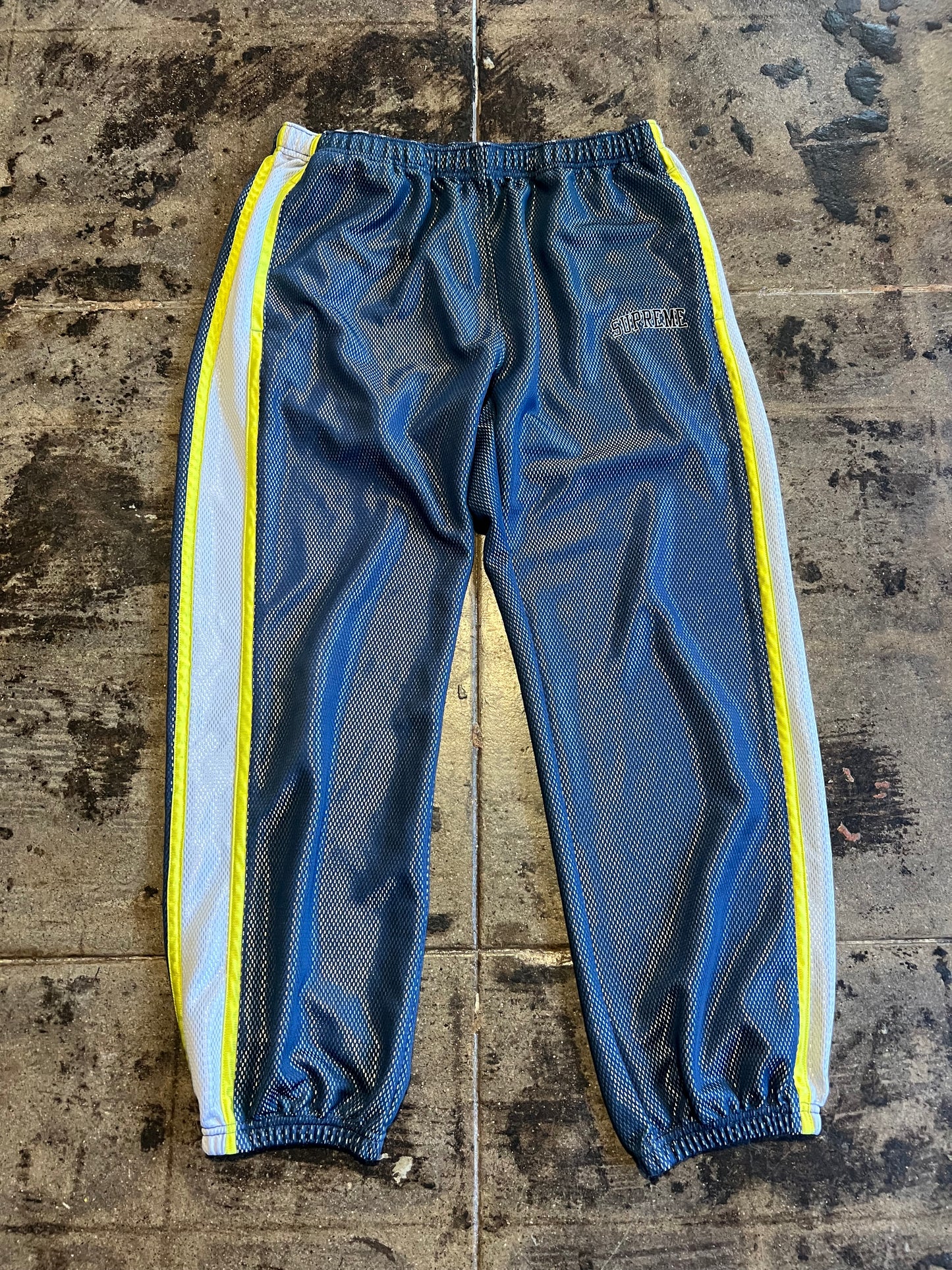 SUPREME BONDED MESH NAVY TRACK PANTS