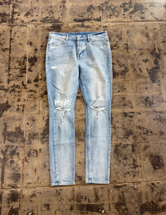 KSUBI RIPPED BLUE JEANS