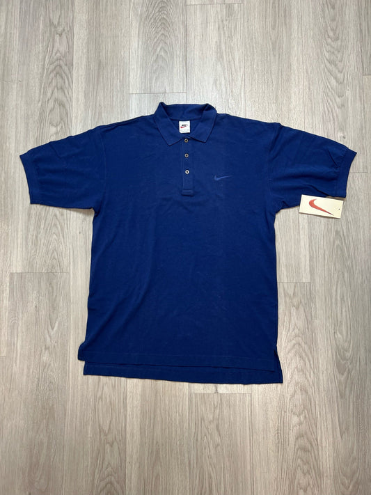 NIKE POLO XLARGE in blue, brand new with tags.