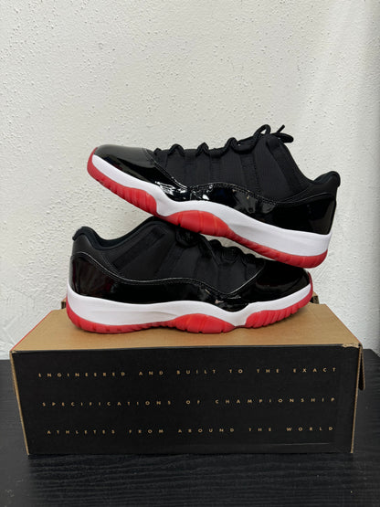 JORDAN 11 LOW BRED