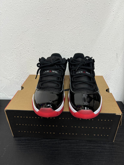 JORDAN 11 LOW BRED