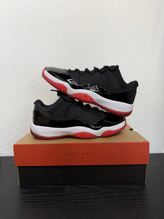 JORDAN 11 LOW BRED (USED